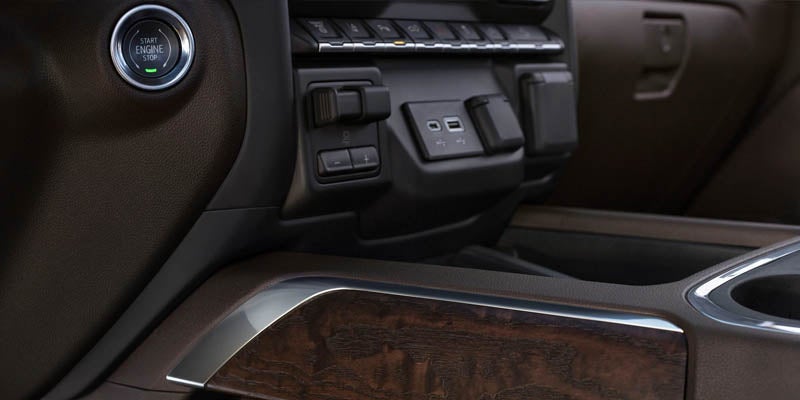 GMC Sierra 2500HD Engine start button with infotainment view