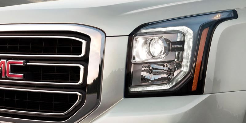 GMC Yukon front side headlight closeup view