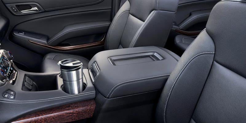 GMC Yukon front seat interior view with infotainment system